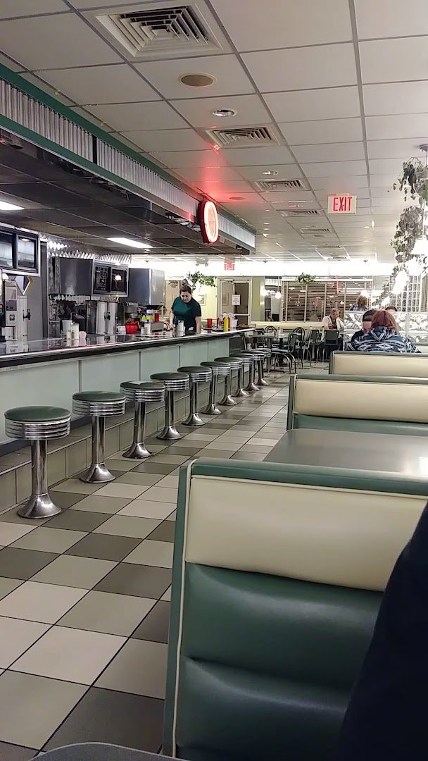 Casual seating inside a 1950s-style diner.
