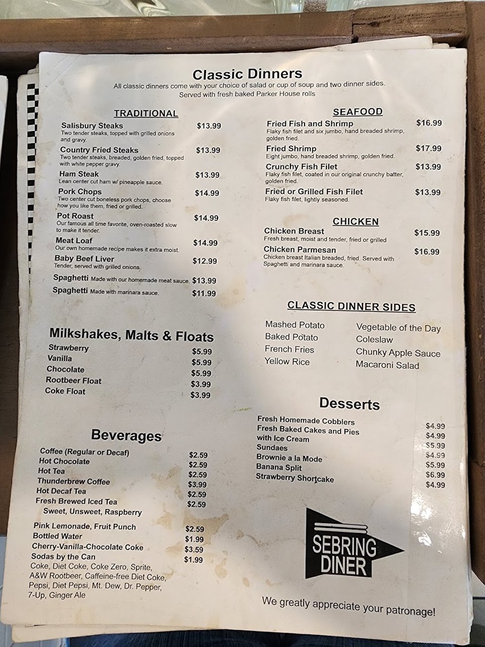 Printed diner menu with salads and sandwiches.
